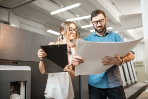 woman-with-print-operator-at-the-manufacturing.jpg